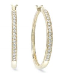 Up your glam factor. YellOra™'s trendy hoop earrings showcase round-cut diamonds front and center (1/2 ct. t.w.). Precious metal made from a combination of pure gold, sterling silver and palladium. Approximate diameter: 1-1/10 inches.