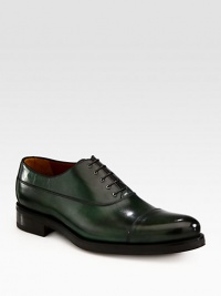 A simple silhouette with striking details, crafted in Italy from washed calfskin leather with a classic captoe finish.Washed leather upperLeather liningPadded insoleLeather soleMade in Italy A simple silhouette with striking details, crafted in Italy from washed calfskin leather with a classic captoe finish.Washed leather upperLeather liningPadded insoleLeather soleMade in Italy