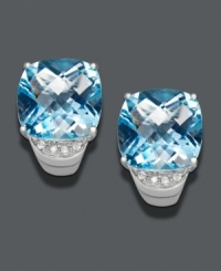 Add a special touch with an extra splash of color. These head-turning studs feature cushion-cut blue topaz (1/4 ct. t.w.) topped off with sparkling diamond accents. Earrings set in sterling silver. Approximate diameter: 3/4 inch.