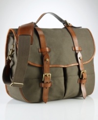 The iconic messenger bag is granted laid-back luxury from a burnished saddle-leather double-buckle closure and embossed signature leather luggage tag for a sharp finish. The iconic messenger bag is granted laid-back luxury from a burnished saddle-leather double-buckle closure and embossed signature leather luggage tag for a sharp finish.