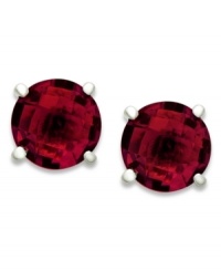Red like a brilliant sunset. Set in sterling silver posts sits brilliant round-cut garnet (6 ct. t.w.). Approximate diameter: 1/2 inch. Red like a brilliant sunset. Set in sterling silver posts sits brilliant round-cut garnet (6 ct. t.w.). Approximate diameter: 1/2 inch.