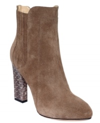 Joan & David's Praxy 7 dress booties have a funky heel that looks great against the smooth suede leather upper. Joan & David's Praxy 7 dress booties have a funky heel that looks great against the smooth suede leather upper.