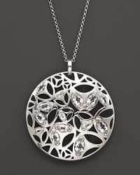 A bold sterling silver pendant glistening with faceted rock crystals. By Di MODOLO. A bold sterling silver pendant glistening with faceted rock crystals. By Di MODOLO.