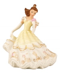 Whisk Belle from the ballroom, right into your home! Imprisoned no more, the kindhearted heroine from Beauty and the Beast radiates happiness in her billowing porcelain gown. Friends Mrs. Potts and Lumiere adorn the Disney collectible in radiant gold. Whisk Belle from the ballroom, right into your home! Imprisoned no more, the kindhearted heroine from Beauty and the Beast radiates happiness in her billowing porcelain gown. Friends Mrs. Potts and Lumiere adorn the Disney collectible in radiant gold.