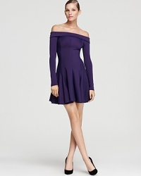 Show off your shoulders in this ponte knit Halston Heritage dress, exuding youthful appeal with a flared circle skirt. Show off your shoulders in this ponte knit Halston Heritage dress, exuding youthful appeal with a flared circle skirt.