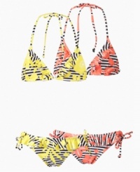 No one will have to read between the lines to know her warm-weather style in this exotic bikini from Roxy. No one will have to read between the lines to know her warm-weather style in this exotic bikini from Roxy.