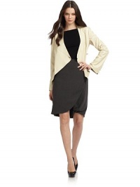 THE LOOKV necklineWrap front with knot closure and interior button panelAsymmetrical front hemLong sleeves with slit cuffsPrincess seams at backPleated peplum at back hemTHE FITAbout 24 from shoulder to longest point of hemTHE MATERIALLeatherPartially linedCARE & ORIGINDry clean by leather specialistMade in Italy THE LOOKV necklineWrap front with knot closure and interior button panelAsymmetrical front hemLong sleeves with slit cuffsPrincess seams at backPleated peplum at back hemTHE FITAbout 24 from shoulder to longest point of hemTHE MATERIALLeatherPartially linedCARE & ORIGINDry clean by leather specialistMade in Italy