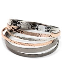 Non-stop elegance. With silver tone, rose-gold tone and hematite tone mixed metals, Nine West's seven piece bangle bracelet set allows you to change your look on the fly. Approximate diameter: 2-1/2 inches. Non-stop elegance. With silver tone, rose-gold tone and hematite tone mixed metals, Nine West's seven piece bangle bracelet set allows you to change your look on the fly. Approximate diameter: 2-1/2 inches.