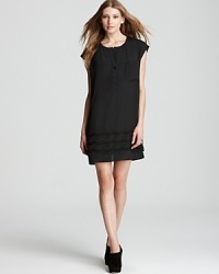 A shirt dress silhouette lends laid-back polish to Susana Monaco's lace trimmed dress.