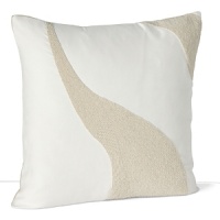A soft wave of shiny beads against a neutral background adorn this decorative pillow from DIANE von FURSTENBERG. A soft wave of shiny beads against a neutral background adorn this decorative pillow from DIANE von FURSTENBERG.