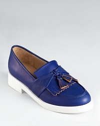 Take on the loafer trend with Pour La Victoire's forward adaptation--with kiltie and tassel details and a thick, bright white sole, the Rissa loafers are utterly of-the-moment. Take on the loafer trend with Pour La Victoire's forward adaptation--with kiltie and tassel details and a thick, bright white sole, the Rissa loafers are utterly of-the-moment.