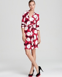 Featuring a punchy print of rich silk jersey, this iconic DIANE von FURSTENBERG wrap dress is an every-season wardrobe staple. Featuring a punchy print of rich silk jersey, this iconic DIANE von FURSTENBERG wrap dress is an every-season wardrobe staple.