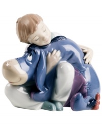 A sweet boy brings a smile even to Eeyore's face in this heartwarming figurine for Winnie the Pooh fans and Lladro collectors. A sweet boy brings a smile even to Eeyore's face in this heartwarming figurine for Winnie the Pooh fans and Lladro collectors.