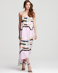 A vibrant geometric print shines against soft pink silk on Tibi's printed Arizona dress. A long, flowing silhouette makes the perfect statement for dressed up days. A vibrant geometric print shines against soft pink silk on Tibi's printed Arizona dress. A long, flowing silhouette makes the perfect statement for dressed up days.