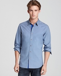A solid sport shirt from Elie Tahari is utterly accessible and totally refined for your everyday wardrobe. Pair it with everything from jeans to dress pants. A solid sport shirt from Elie Tahari is utterly accessible and totally refined for your everyday wardrobe. Pair it with everything from jeans to dress pants.