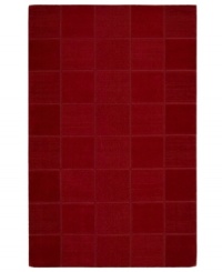 An a-tonal blocked design in rich red creates a warm & modern accent in the Westport area rug from Nourison. Hand-tufted in India of pure wool for premium softness and durability. An a-tonal blocked design in rich red creates a warm & modern accent in the Westport area rug from Nourison. Hand-tufted in India of pure wool for premium softness and durability.