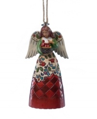 The cardinal was once a symbol of good luck, and Jim Shore re-introduces it to a new generation in this beautiful angel ornament. The cardinal was once a symbol of good luck, and Jim Shore re-introduces it to a new generation in this beautiful angel ornament.