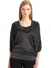 THE LOOKMetallic thread detailsPullover styleCowlneckThree-quarter length dolman sleevesRibbed banded hemTHE FITAbout 23 from shoulder to hemTHE MATERIAL70% viscose/16% nylon/14% metallic polyesterCARE & ORIGINDry cleanImportedModel shown is 5'10 (177cm) wearing US size Small. THE LOOKMetallic thread detailsPullover styleCowlneckThree-quarter length dolman sleevesRibbed banded hemTHE FITAbout 23 from shoulder to hemTHE MATERIAL70% viscose/16% nylon/14% metallic polyesterCARE & ORIGINDry cleanImportedModel shown is 5'10 (177cm) wearing US size Small.