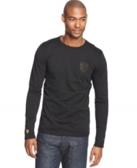 Catch the checkered flag in this winning Ferrari logo shirt from Puma. Catch the checkered flag in this winning Ferrari logo shirt from Puma.