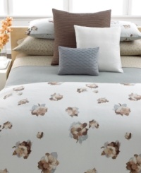 Cool and warm tones commingle in this Teaflower duvet cover from Calvin Klein, featuring an abstract watercolor floral design on a pale aqua ground. Cool and warm tones commingle in this Teaflower duvet cover from Calvin Klein, featuring an abstract watercolor floral design on a pale aqua ground.