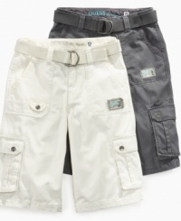 Easy going. Match his cool casual with these no-nonsense belted cargo shorts from Guess, a perfect pair for summer play. Easy going. Match his cool casual with these no-nonsense belted cargo shorts from Guess, a perfect pair for summer play.