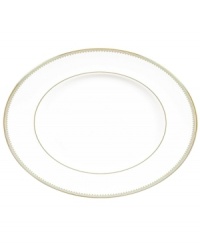 Serve with the impeccable style of Vera Wang. This serving platter shines with a textured band of golden grosgrain along the edge. Perfect for side dishes or smaller main courses. Serve with the impeccable style of Vera Wang. This serving platter shines with a textured band of golden grosgrain along the edge. Perfect for side dishes or smaller main courses.