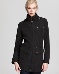 Flaunt rainy day style with Laundry by Shelli Segal's sleek anorak boasting pockets aplenty and a flattering cinched waist. Flaunt rainy day style with Laundry by Shelli Segal's sleek anorak boasting pockets aplenty and a flattering cinched waist.