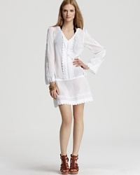Ondedemar proves beach brights are always just right with this white voile coverup. Teamed with leather flip flops and a wide-brimmed hat, versatile tunic is a cool classic. Ondedemar proves beach brights are always just right with this white voile coverup. Teamed with leather flip flops and a wide-brimmed hat, versatile tunic is a cool classic.