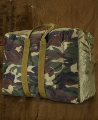 An ideal size for travel, a camouflage canvas duffle bag features an interior media pocket and ample space for all your storage needs. An ideal size for travel, a camouflage canvas duffle bag features an interior media pocket and ample space for all your storage needs.