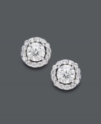 Style fit for a star. Wear this sparkling pair for any occasion, but be prepared to turn heads. Round-cut diamonds (1/2 ct. t.w.) shine amongst a halo of diamond accents. Crafted in 14k white gold. Approximate diameter: 6-2/10 mm.