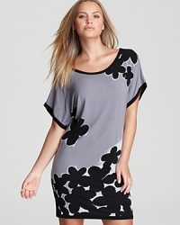 An abstract flower print decorates this easy-to-wear sleepshirt from DKNY, so effortless you may find yourself wearing it for more than just sleep. An abstract flower print decorates this easy-to-wear sleepshirt from DKNY, so effortless you may find yourself wearing it for more than just sleep.