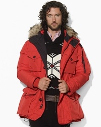 Cover all your cold-weather needs in a heavy-duty down parka featuring multiple utility pockets, storm cuffs for additional warmth and a trimmed hood to block out the elements. Cover all your cold-weather needs in a heavy-duty down parka featuring multiple utility pockets, storm cuffs for additional warmth and a trimmed hood to block out the elements.