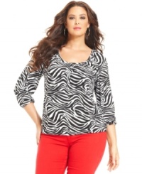 Capture safari style with MICHAEL Michael Kors' three-quarter-sleeve plus size top, featuring a zebra-print. Capture safari style with MICHAEL Michael Kors' three-quarter-sleeve plus size top, featuring a zebra-print.