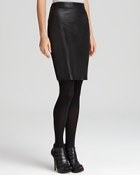 Streamline your 9-to-5 style with a luxe leather DKNY skirt accentuated with vertical seaming for a flawless silhouette. Streamline your 9-to-5 style with a luxe leather DKNY skirt accentuated with vertical seaming for a flawless silhouette.