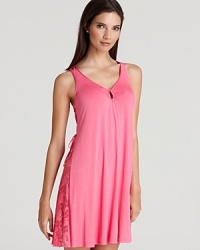 With sheer lace panels, Midnight by Carole Hochman's Lace Embrace chemise stands out in bright azalea pink. With sheer lace panels, Midnight by Carole Hochman's Lace Embrace chemise stands out in bright azalea pink.