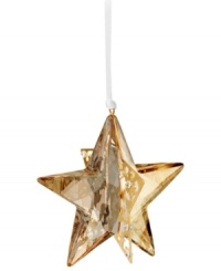 Star bright. The Golden Shadow Star ornament brings new brilliance to modern holidays, combining the gleam of Swarovski crystal with goldtone metal and sparkling chatons. Star bright. The Golden Shadow Star ornament brings new brilliance to modern holidays, combining the gleam of Swarovski crystal with goldtone metal and sparkling chatons.