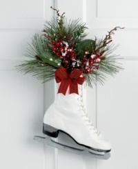 Hang up your skates. With frosted accents and a fresh holiday bouquet, this classic boot offers a whimsical expression of the season. Hang up your skates. With frosted accents and a fresh holiday bouquet, this classic boot offers a whimsical expression of the season.