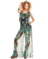 Make your style roar with this jumpsuit from XOXO, where sheer, illusion design and an Amazonian-wild print team up to create the ultimate statement-maker! Make your style roar with this jumpsuit from XOXO, where sheer, illusion design and an Amazonian-wild print team up to create the ultimate statement-maker!