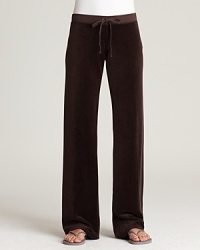 Juicy Couture's signature velour pants are perfect for lounging on the weekends. Juicy Couture's signature velour pants are perfect for lounging on the weekends.
