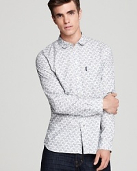 A small paisley print shirt with a tailored, slim fit from the masterful innovator Paul Smith. A small paisley print shirt with a tailored, slim fit from the masterful innovator Paul Smith.