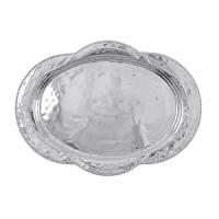 Shaped by hand of durable recycled aluminum, this striking platter from Mariposa is detailed with a softly textured finish and beaded edges for a look that's at once organic and refined. Shaped by hand of durable recycled aluminum, this striking platter from Mariposa is detailed with a softly textured finish and beaded edges for a look that's at once organic and refined.
