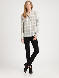 Ruffled neckline and houndstooth-inspired check print renew this lightweight silk blouse. Ruffled necklineLong sleeves with buttoned cuffsButton frontSilkDry cleanImportedModel shown is 5'9½ (176cm) wearing US size Small.