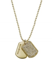 Say yes sir to this salutable style. Michael Kors adds some glam to a classic set of dog tags. Crafted in gold tone mixed metal with pave-set glass accents and a trendy ball chain. Approximate length 18 inches. Approximate drop length: 3/4 inch. Approximate drop width: 1/2 inch. Say yes sir to this salutable style. Michael Kors adds some glam to a classic set of dog tags. Crafted in gold tone mixed metal with pave-set glass accents and a trendy ball chain. Approximate length 18 inches. Approximate drop length: 3/4 inch. Approximate drop width: 1/2 inch.