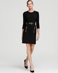 Inject your LBD portfolio with modern edge in this MICHAEL Michael Kors dress, touting sleek gold-tone zip accents and a statement leather belt for strong femininity. Inject your LBD portfolio with modern edge in this MICHAEL Michael Kors dress, touting sleek gold-tone zip accents and a statement leather belt for strong femininity.