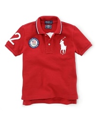 This preppy short-sleeve polo shirt in breathable cotton mesh celebrates Team USA's participation in the 2012 Olympics with the official U.S. Olympic Team logo and the Big Pony at front and London embroidery at the back. This preppy short-sleeve polo shirt in breathable cotton mesh celebrates Team USA's participation in the 2012 Olympics with the official U.S. Olympic Team logo and the Big Pony at front and London embroidery at the back.
