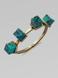 An architectural piece with four turquoise cube stones on a hinged bangle. TurquoiseBrassDiameter, about 2½Hinged closureMade in USA An architectural piece with four turquoise cube stones on a hinged bangle. TurquoiseBrassDiameter, about 2½Hinged closureMade in USA