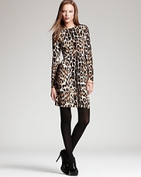 Exotics go executive as chic cheetah print enlivens an essential Karen Kane dress. Sheer tights and sleek booties take the style from feline to fierce. Exotics go executive as chic cheetah print enlivens an essential Karen Kane dress. Sheer tights and sleek booties take the style from feline to fierce.