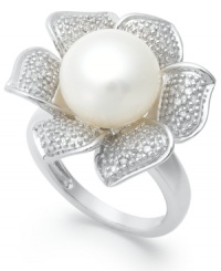A true beauty. A cultured freshwater pearl (10 mm) and sparkling round-cut diamonds (1/10 ct. t.w.) adorn this exquisite flower ring. Set in sterling silver. Approximate width: 1 inch. Size 7. A true beauty. A cultured freshwater pearl (10 mm) and sparkling round-cut diamonds (1/10 ct. t.w.) adorn this exquisite flower ring. Set in sterling silver. Approximate width: 1 inch. Size 7.