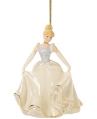 Fans of Disney will be enchanted by this beautiful Cinderella ornament from Lenox. The princess wears a traditional ballgown with sparkle accents. With gold hanging thread. Fans of Disney will be enchanted by this beautiful Cinderella ornament from Lenox. The princess wears a traditional ballgown with sparkle accents. With gold hanging thread.