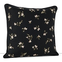 Embroidered blossoms cascade across a bold black ground with hints of sage, pale yellow and rose. Embroidered blossoms cascade across a bold black ground with hints of sage, pale yellow and rose.